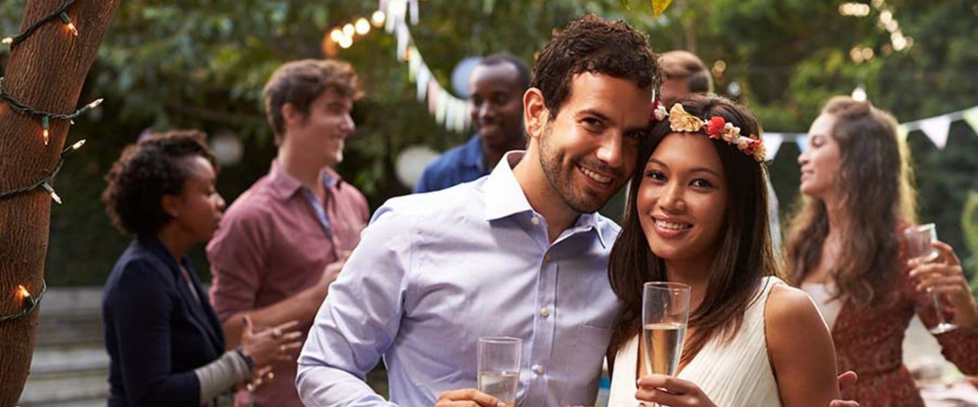 A bride and groom in a backyard wedding A bride and groom in a backyard wedding